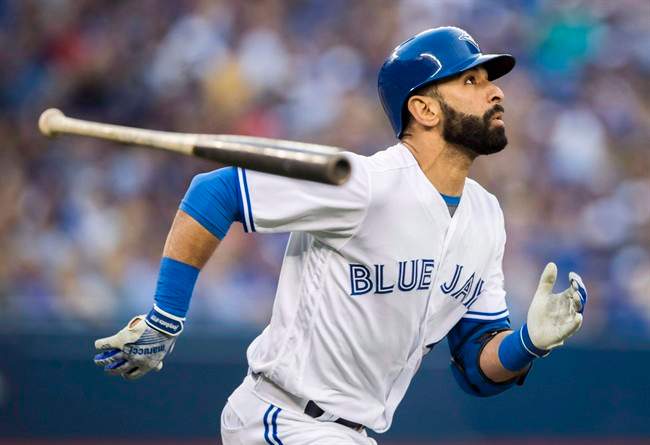 Toronto Blue Jays' Jose Bautista watches a ball go foul against the New York Yankees during the third inning of MLB baseball action in Toronto, Tuesday May 31, 2016.