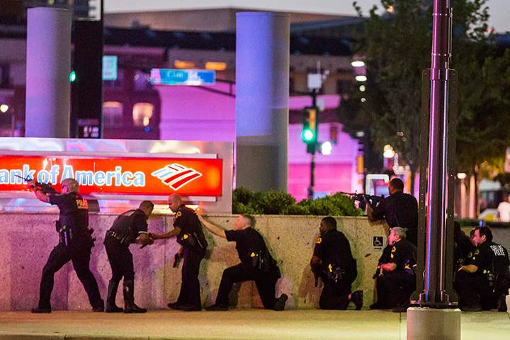 Dallas Police respond after shots were fired at a Black Lives Matter rally in downtown Dallas on Thursday, July 7, 2016.