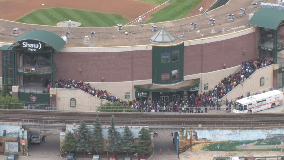 Fans line up outside Shaw Park before a  Goldeyes game.