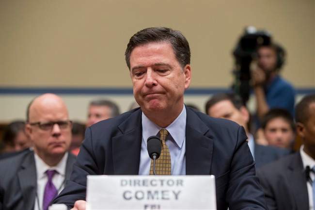 FBI Director James Comey pauses while testifying on Capitol Hill in Washington, Thursday, July 7, 2016, before the House Oversight Committee to explain his agency's recommendation to not prosecute Hillary Clinton, now the Democratic presidential candidate, over her private email setup during her time as secretary of state.