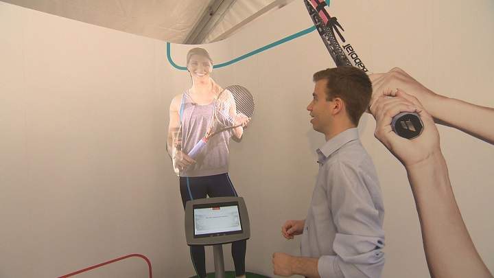 Global Montreal’s Howard Cohen interacts with a hologram of Eugenie Bouchard. Sunday, July 31, 2016.