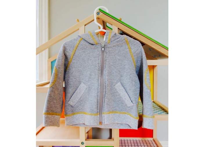 Clothes specially designed for children with dwarfism by Oli & Bou.