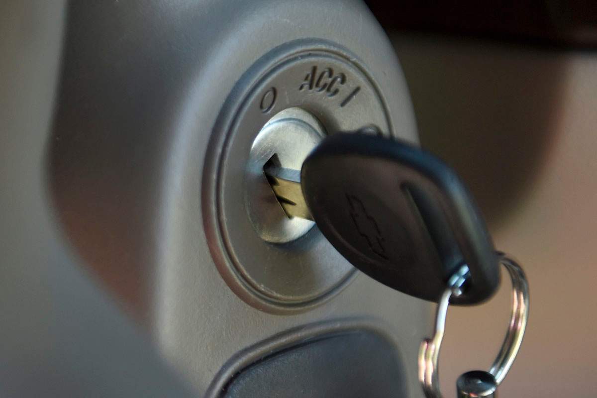 This Tuesday, April 1, 2014, file photo shows a key in the ignition switch of a 2005 Chevrolet Cobalt in Alexandria, Va. 