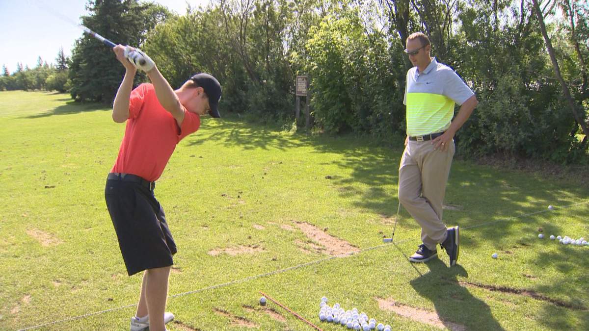 Derek Ingram keeps a close eye on a golfer at the Elmhurst Golf & Country Club driving range in this July 16, 2016, file photo.