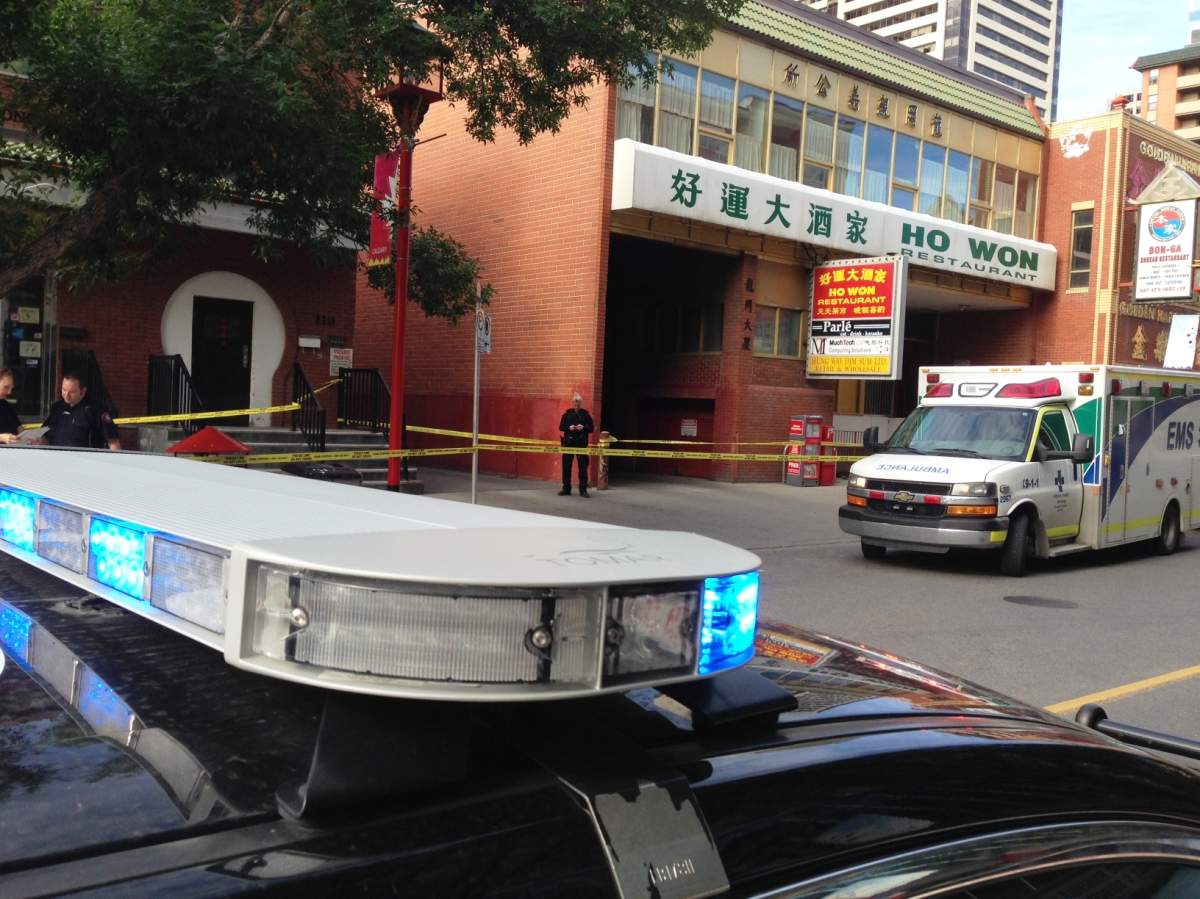 Police investigate after a man was found seriously injured in the 100 block of 2 Avenue S.E. on Friday, July 8, 2016.