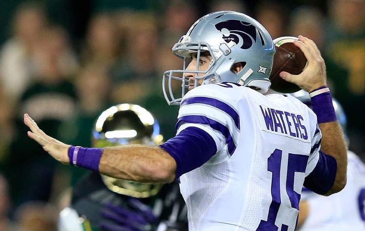 Jake Waters #15 of the Kansas State Wildcats passes against the Baylor Bears during the first half of the game on December 6, 2014 at McLane Stadium in Waco, Texas. (Photo by Jamie Squire/Getty Images)