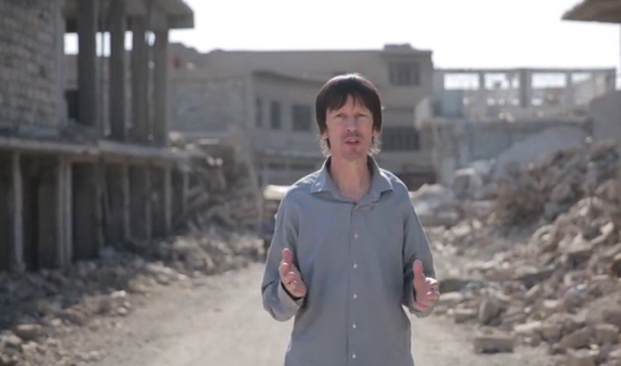 This photo posted online by the Islamic State group-affiliated Amaq News Agency on Tuesday, July 12 2016 shows British journalist John Cantlie.