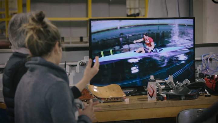 Researchers watch high-speed footage of a Canadian kayaker