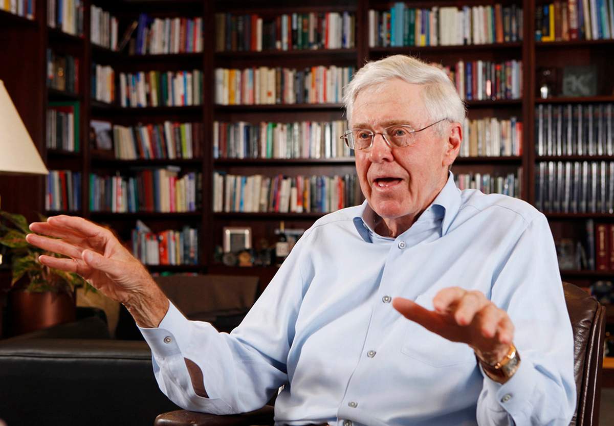In this photo May 22, 2012 file photo, Charles Koch speaks in his office at Koch Industries in Wichita, Kansas. 