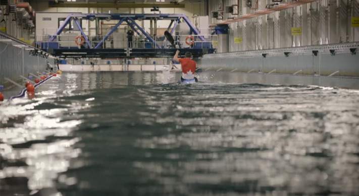 A Canadian kayaker paddling in the NRC's tow tank