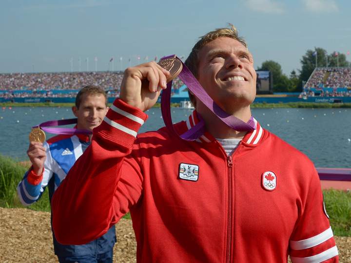 Canada’s Mark De Jonge displays his bronze medal, won in the kayak single (K1) 200m men’s final A during the London 2012 Olympic Games.