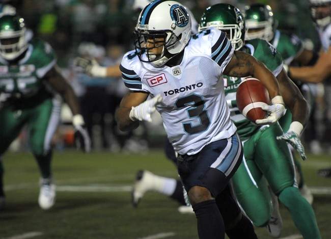 Toronto Argonauts running back Brandon Whitaker runs the ball during CFL action against the Saskatchewan Roughriders, in Regina on Thursday, June 30, 2016. 