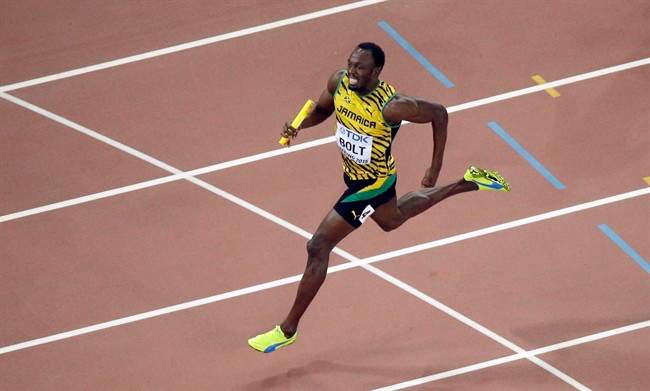 In this Aug. 29, 2015, file photo, Jamaica's Usain Bolt, right, anchors the Jamaican team to the finish line as Jamaica wins the men's 4x100 meter relay final at the World Athletics Championships in Beijing. Jamaican officials say Bolt has withdrawn from his country's National Senior Championships, citing an unspecified injury. Bolt had qualified for the 100-meter final on Friday, July 1, 2016, and was scheduled to compete in the 200-meter events Saturday and Sunday.