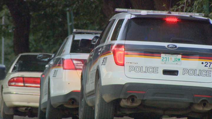Two people facing charges after stolen truck hits fence as driver tries to evade Saskatoon police.
