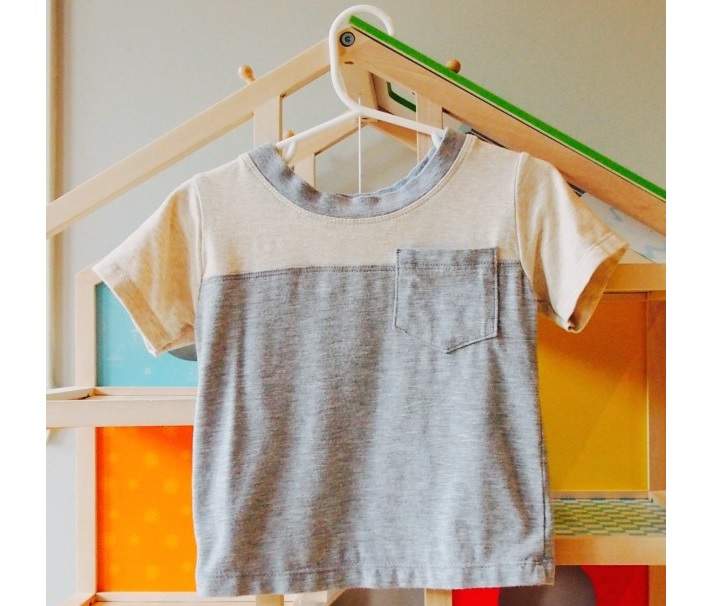 Clothes specially designed for children with dwarfism by Oli & Bou.
