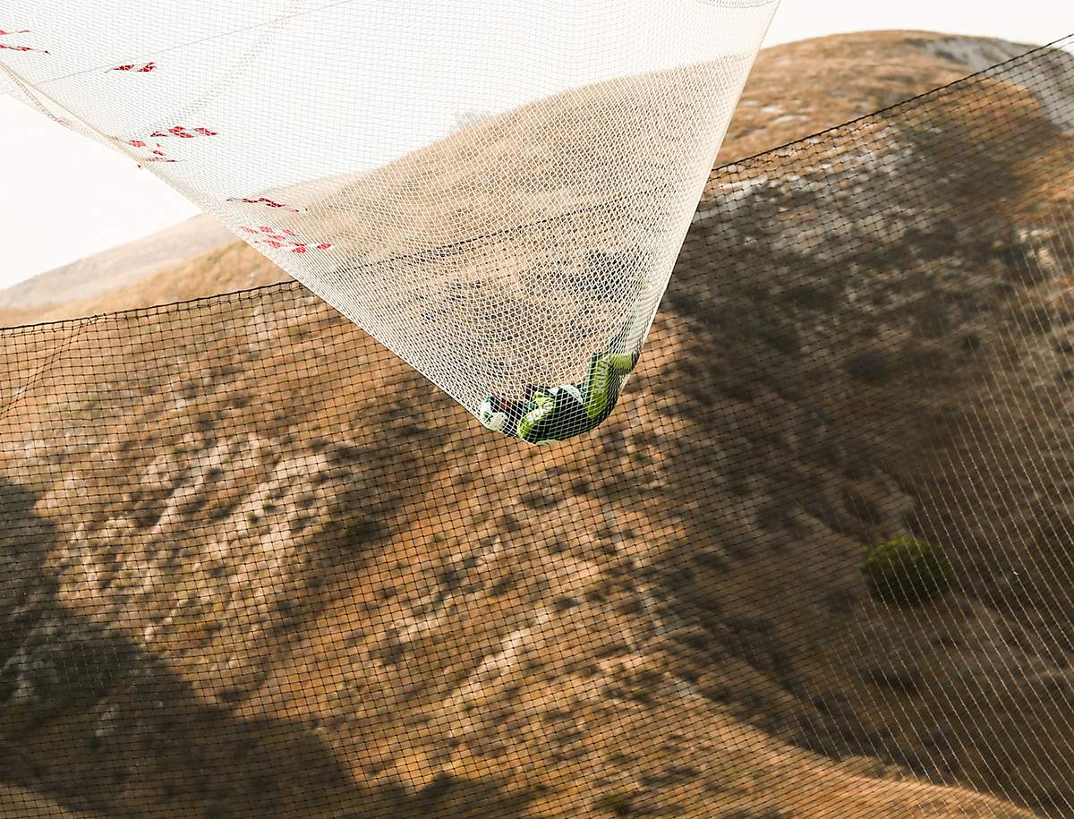 Skydiver Luke Aikins lands safely after jumping 25,000 feet from an airplane without a parachute or wing suit in Simi Valley, California. (Photo by Mark Davis/Getty Images for Stride Gum)