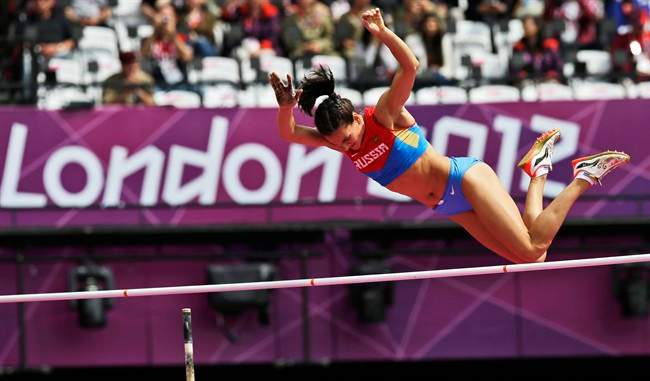 In this Aug. 4, 2012 file picture Russia's Yelena Isinbayeva competes in a women's pole vault qualification round during the athletics in the Olympic Stadium at the 2012 Summer Olympics, London. The Court of Arbitration for Sport was scheduled to issue a verdict Thursday July 21, 2016 in the case of 68 Russian track and field athletes seeking to overturn the ban imposed by the IAAF following allegations of state-sponsored doping and cover-ups.