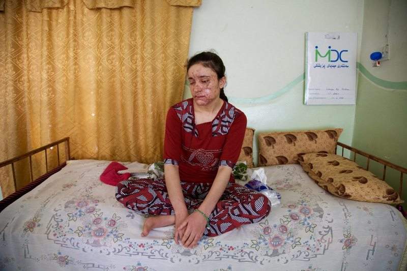 Lamiya Aji Bashar, an 18-year-old Yazidi girl who escaped her Islamic State group enslavers, talks to The Associated Press in northern Iraq in this May 5, 2016, photo. 