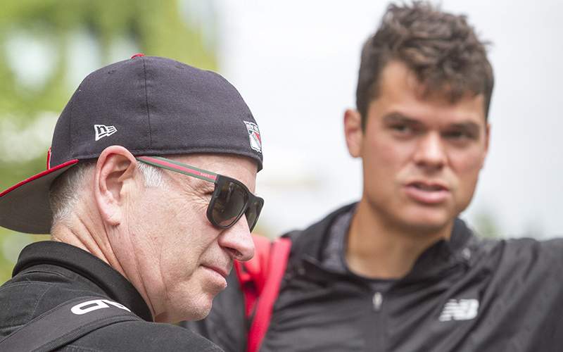 John McEnroe and Milos Raonic on Jun. 21, 2016.