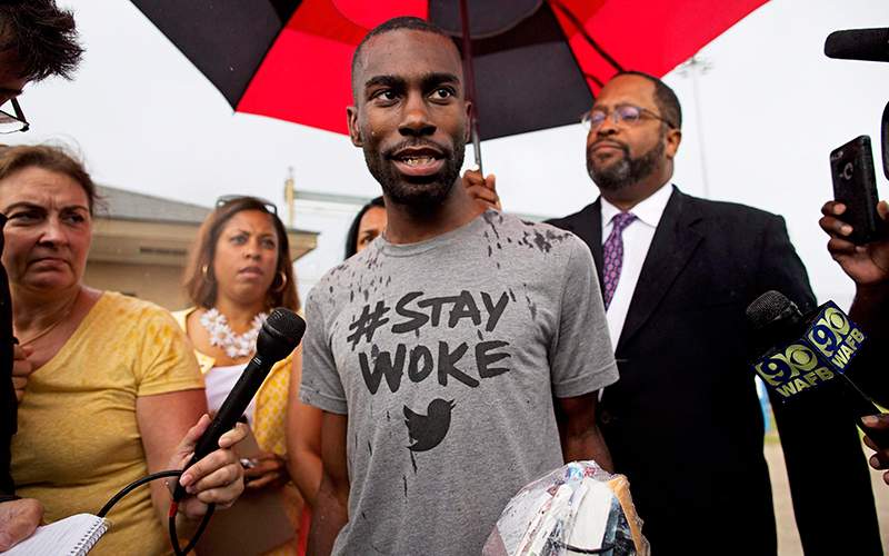 Black Lives Matter activist DeRay Mckesson talks to the media after his release from the Baton Rouge jail in Baton Rouge, La. on Sunday, July 10, 2016. 