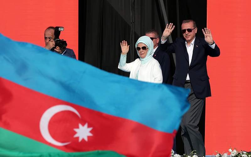 Turkish President Recep Tayyip Erdogan and his wife Emine Erdogan delivers a speech during a Democracy and Martyrs' Rally in Istanbul, Sunday, August 7, 2016. 