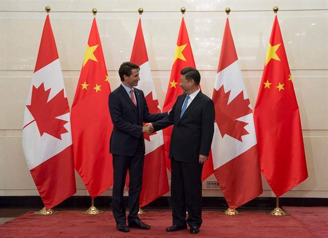 Chinese President Xi Jinping welcomes Canadian Prime Minister Justin Trudeau to the Diaoyutai State Guesthouse in Beijing, Wednesday August 31, 2016. China has rejected Canada's efforts to inject labour standards into a free trade agreement.