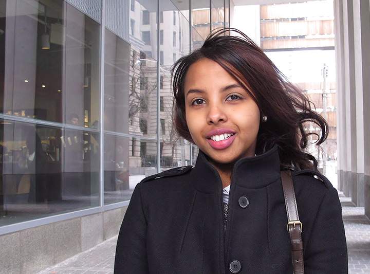 Ayaan Farah, 31, is seen outside Federal Court in Toronto on Monday, Jan. 11, 2016. Farah lost her eight-year airport job after RCMP said she had associated with three individuals with criminal records but would not say who they were. There are no allegations she did anything criminal. 