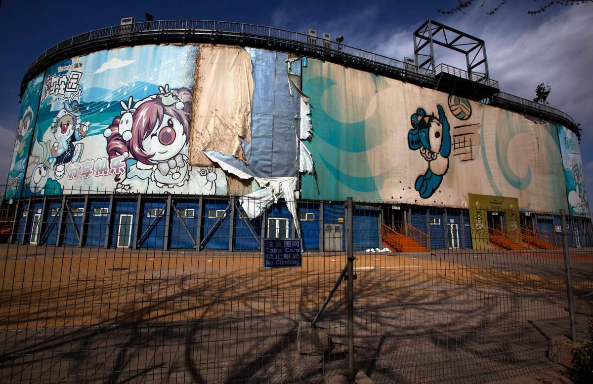 The 2008 Beijing Olympics venue for the beach volleyball competition lies deserted and unmaintained in central Beijing April 2, 2012. REUTERS/David Gray