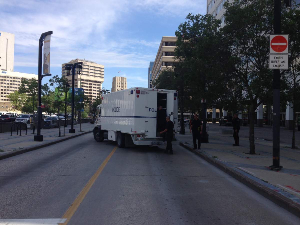 Bomb squad arrives on scene.