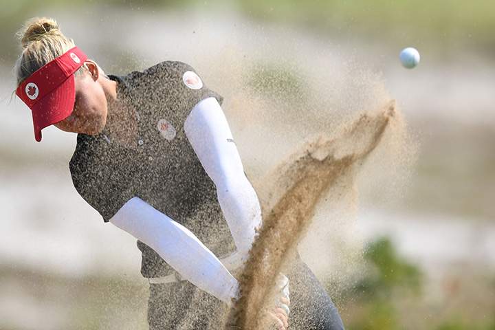 Canada’s Brooke Henderson competes in the women’s individual stroke play at the Olympic Golf course during the Rio 2016 Olympic Games in Rio de Janeiro on August 19, 2016.