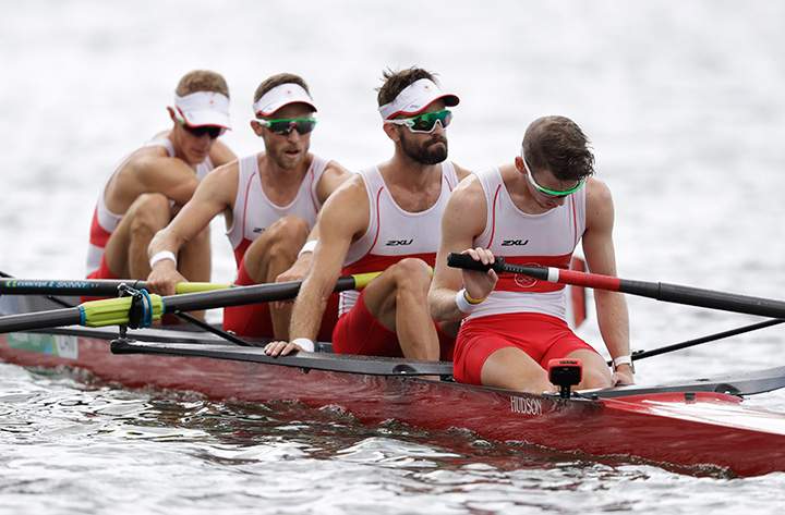 Maxwell Lattimer, Brendan Hodge, Nicolas Pratt, and Eric Woelfl, of Canada, rest after competing in the men’s lightweight four repechage heat during the 2016 Summer Olympics in Rio de Janeiro, Brazil, Monday, Aug. 8, 2016.