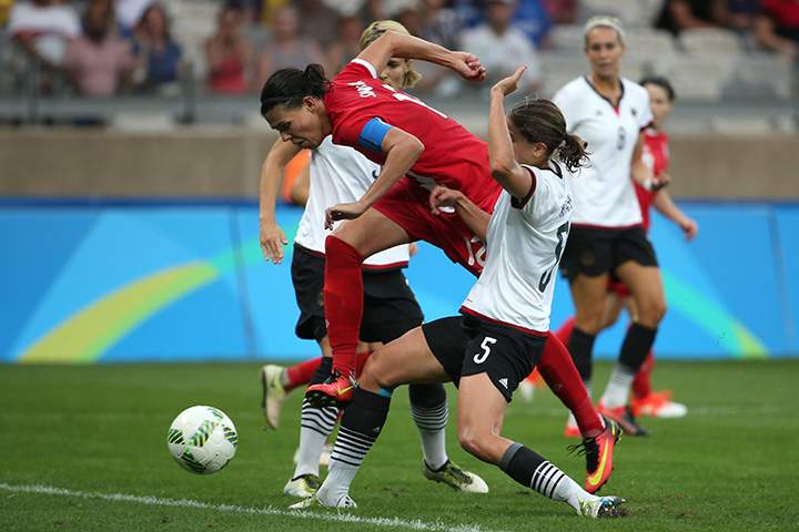 Canada’s Christine Sinclair and Germany’s Annike Krahn vie for the ball during a semi-final match of the women’s Olympic football tournament between at the Mineirao stadium in Belo Horizonte, Brazil, Tuesday Aug. 16, 2016.