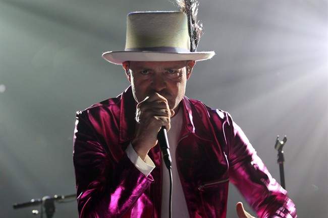 The Tragically Hip's Gord Downie, performs during the first stop of the Man Machine Poem Tour at the Save-On-Foods Memorial Centre in Victoria, B.C., Friday, July 22, 2016.