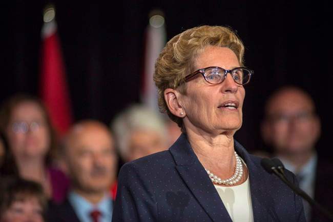 Premier Kathleen Wynne is defending a plan to ban all elected provincial politicians from fundraising.