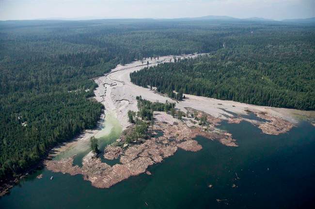 Contents from a tailings pond is pictured going down the Hazeltine Creek into Quesnel Lake near the town of Likely, B.C. on August, 5, 2014. It's been two years since millions of cubic metres of mine waste gushed from a tailings pond at the Mount Polley mine in British Columbia's Interior. The government says it has implemented tough new regulatory standards, while environmental groups say more protections are needed and residents just want their pristine lake back. 