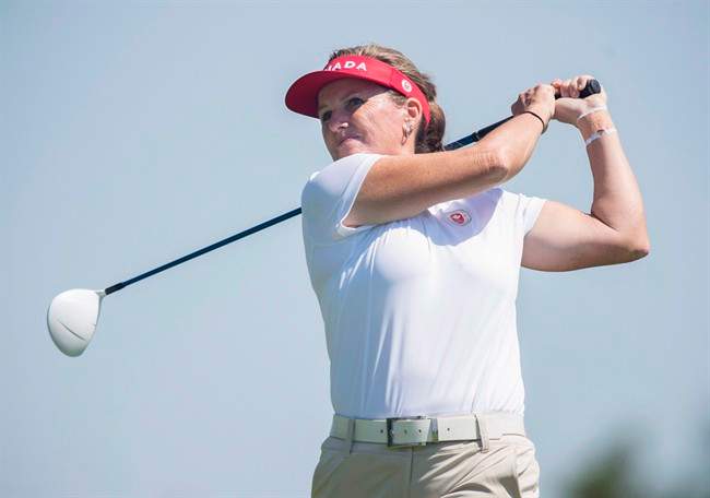 Lorie Kane of Canada hits a tee shot in women\’s individual golf at the 2015 Pan Am Games at Angus Glen Golf Club in Markham, Ont., on Thursday, July 16, 2015.