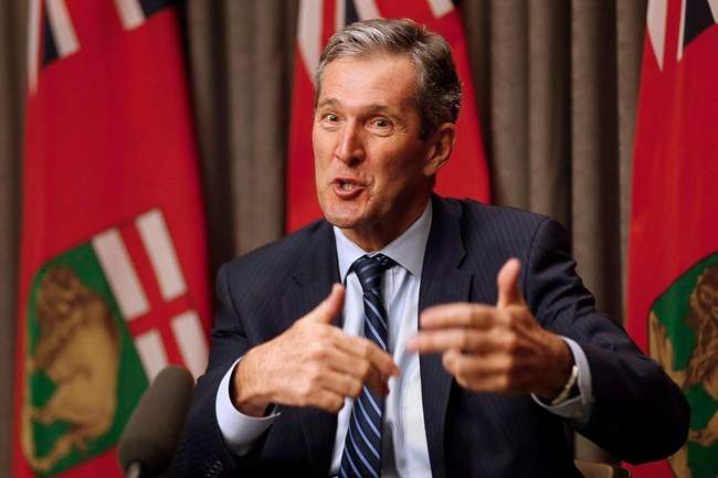 Manitoba Premier Brian Pallister speaking .