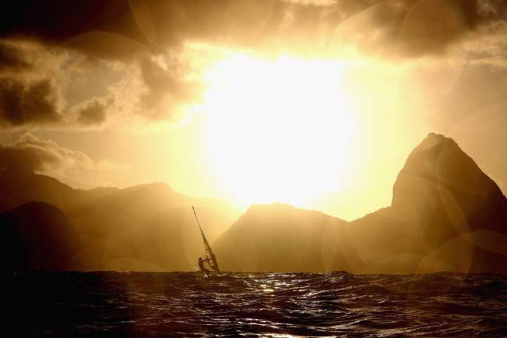 An RS-X athlete is seen on the way back to the marina after the conclusion of racing on Day 7 of the Rio 2016 Olympic Games at Marina da Gloria on August 12, 2016 in Rio de Janeiro, Brazil.
