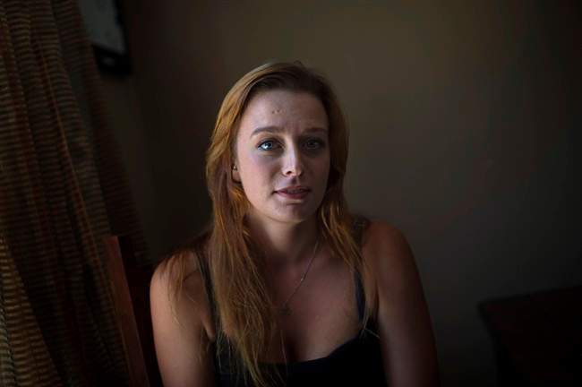 Shannon Graham poses in her home in Bridgewater, N.S. on Saturday, August 27, 2016. Graham says she regrets reporting her sexual assault to the police and says she wants to let people know how the criminal justice system works. 