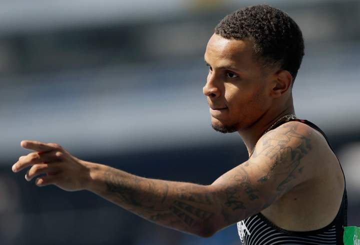 Canada's Andre De Grasse competes in a men's 200-meter heat