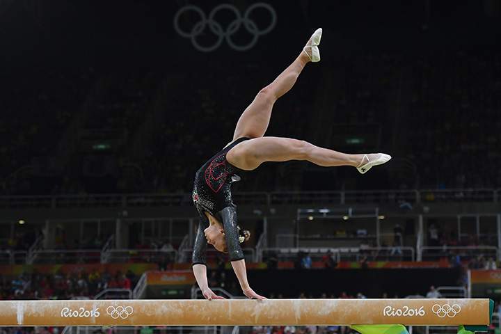 Canada's Ellie Black competes in the beam event of the women's individual all-around final of the Artistic Gymnastics at the Olympic Arena during the Rio 2016 Olympic Games in Rio de Janeiro on August 11, 2016. 