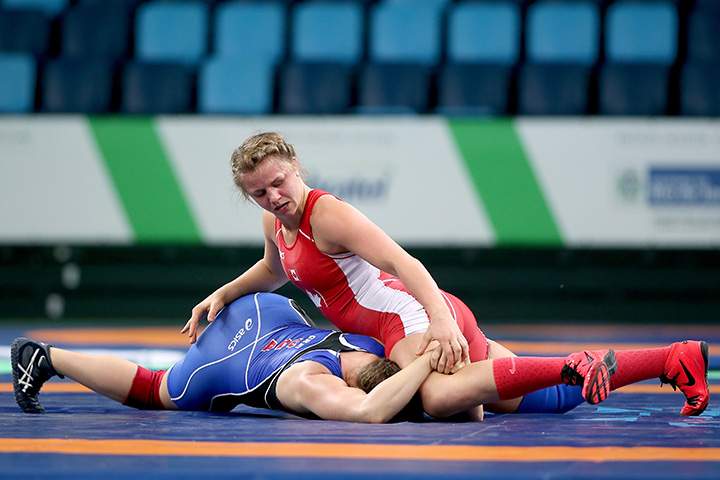 Canada’s Erica Wiebe wrestles Adeline Gray of the United States in the freestyle 75 kg during the women’s wrestling tournament at Olympic Park on January 31, 2016 in Rio de Janeiro, Brazil.
