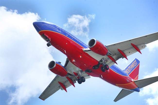In a June 6, 2016, file photo, a Southwest Airlines jet gets ready to land at Tampa International Airport, in Tampa, Fla.