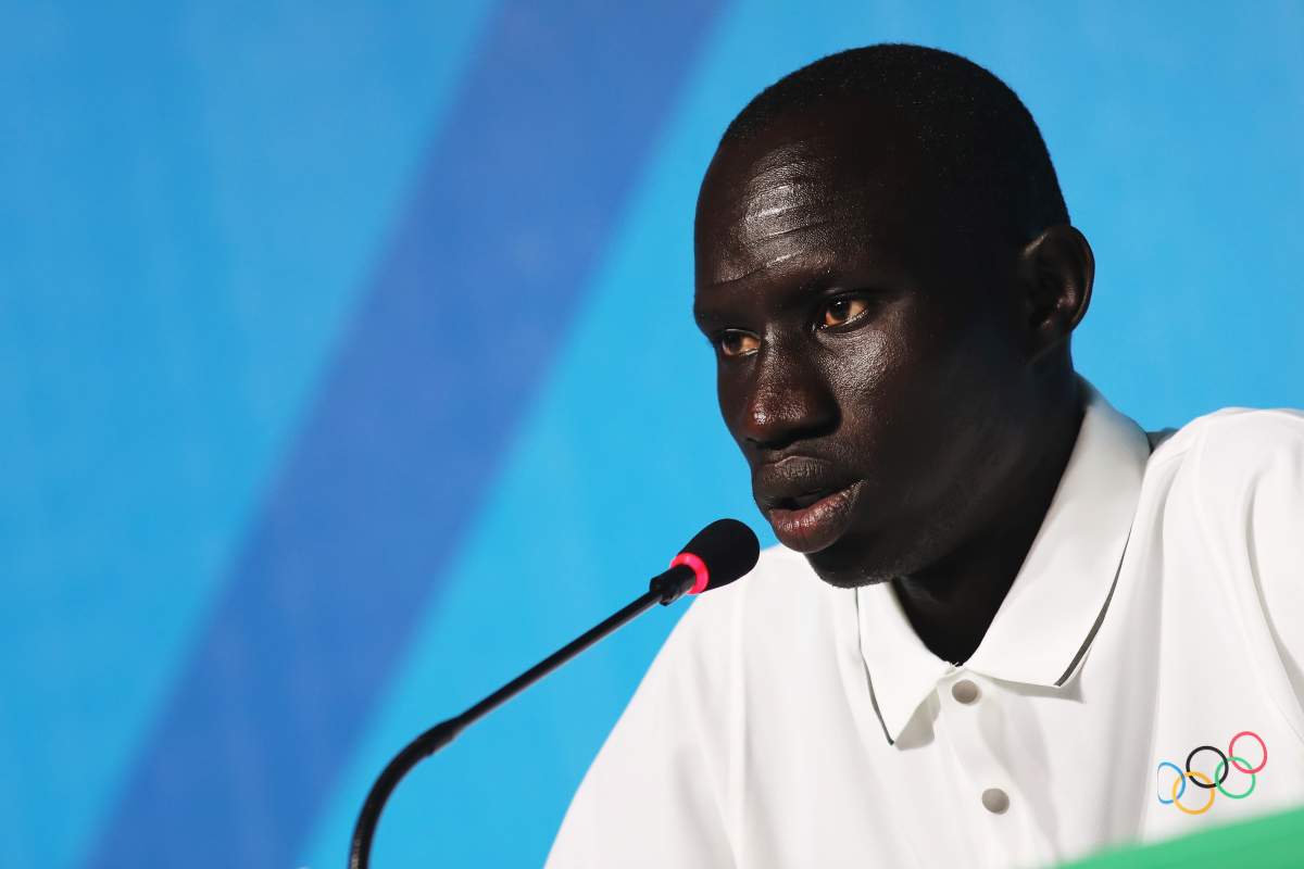 Yiech Pur Biel of the Olympic Refugee Team talks while attending a press conference given by the Olympic Refugee Team on July 31, 2016 in Rio de Janeiro, Brazil.