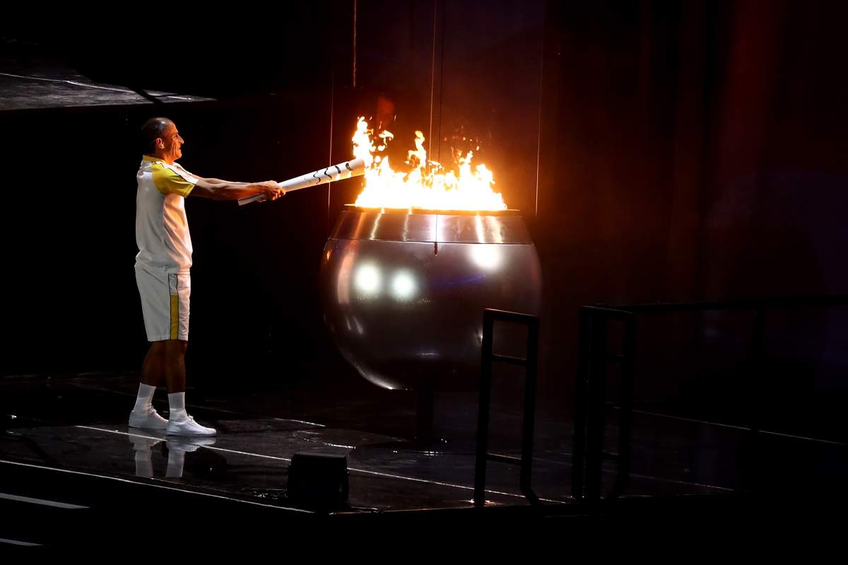 Former athlete Vanderlei de Lima lights the Olympic Flame during the Opening Ceremony of the Rio 2016 Olympic Games at Maracana Stadium on August 5, 2016 in Rio de Janeiro, Brazil. (