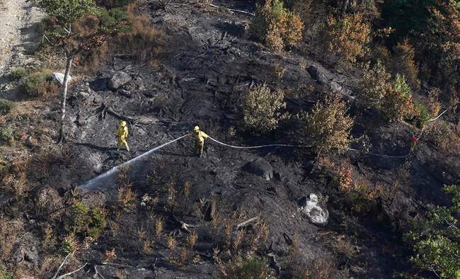 A fire crew works at the Maitland Bridge in Annapolis County in 2016.