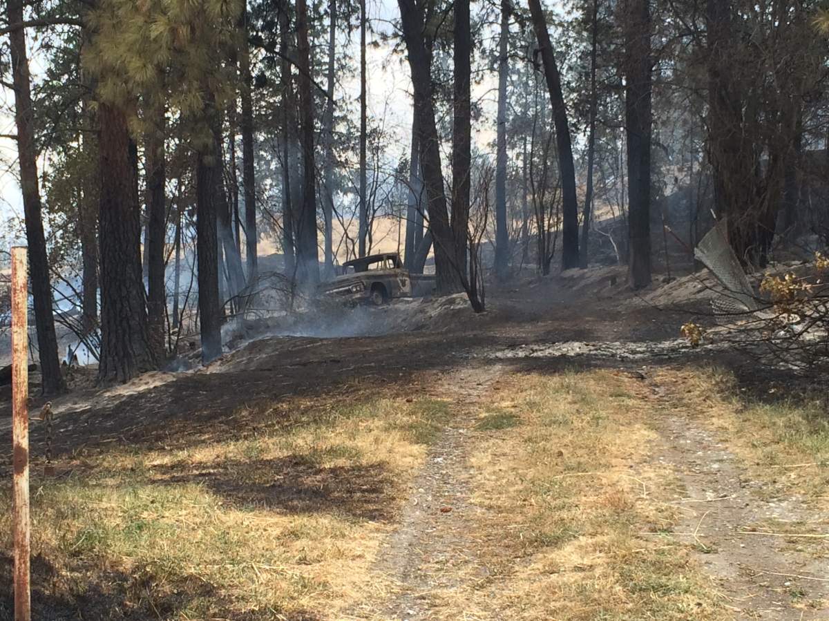Truck destroyed by flames from the Bear Creek wildfire.