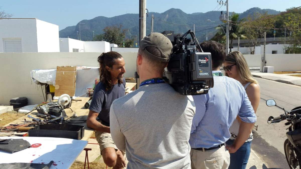 The Global News team interviews Delto de Oliveira in his new neighbourhood in Rio.