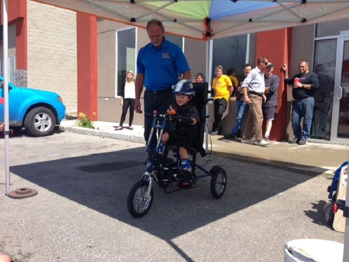 Jacoby begins pedalling on his own for the first time.