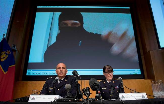 Instead of charging ISIS supporter Aaron Driver, seen in video at an RCMP press conference, police filed a peace bond against him. He was later killed while attempting a bombing in Ontario.